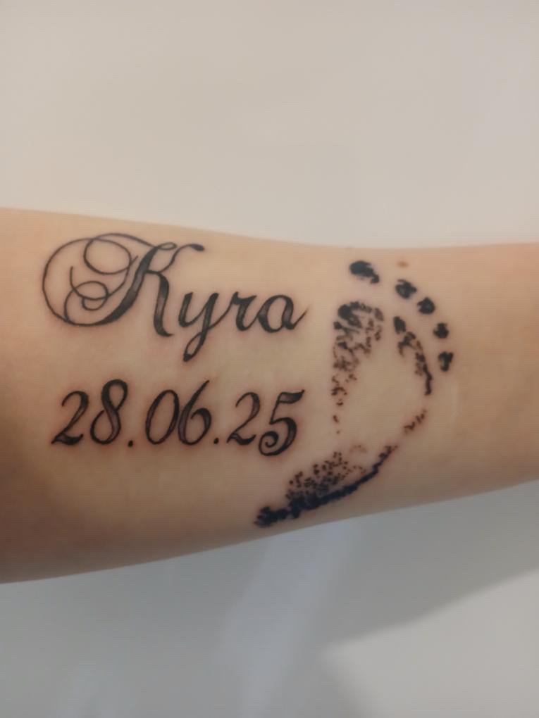 custom tattoo of baby print